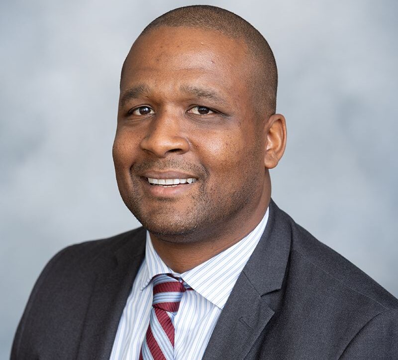 Headshot style photo of Dr. Fletcher.