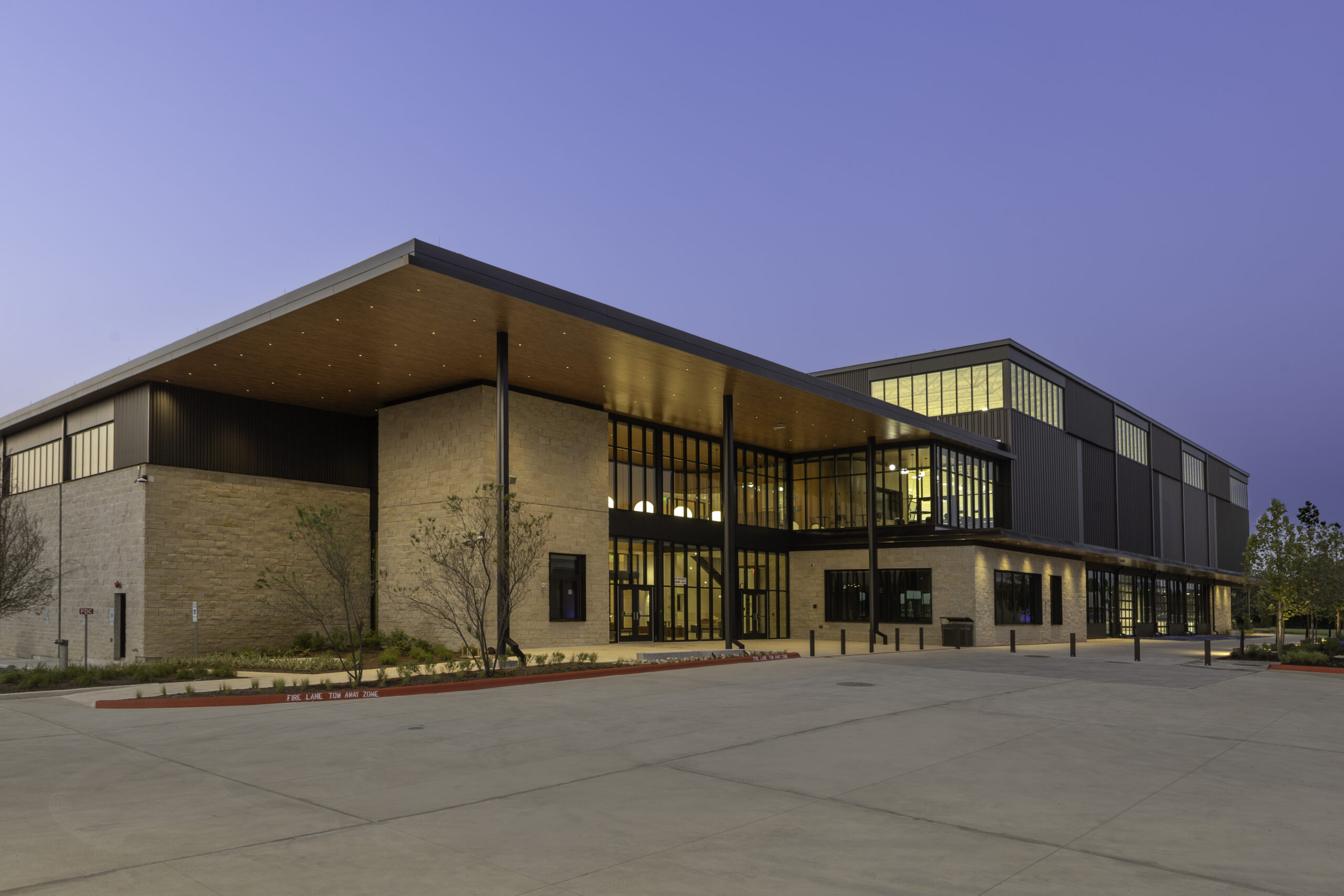 Photo of front of athletics complex building.
