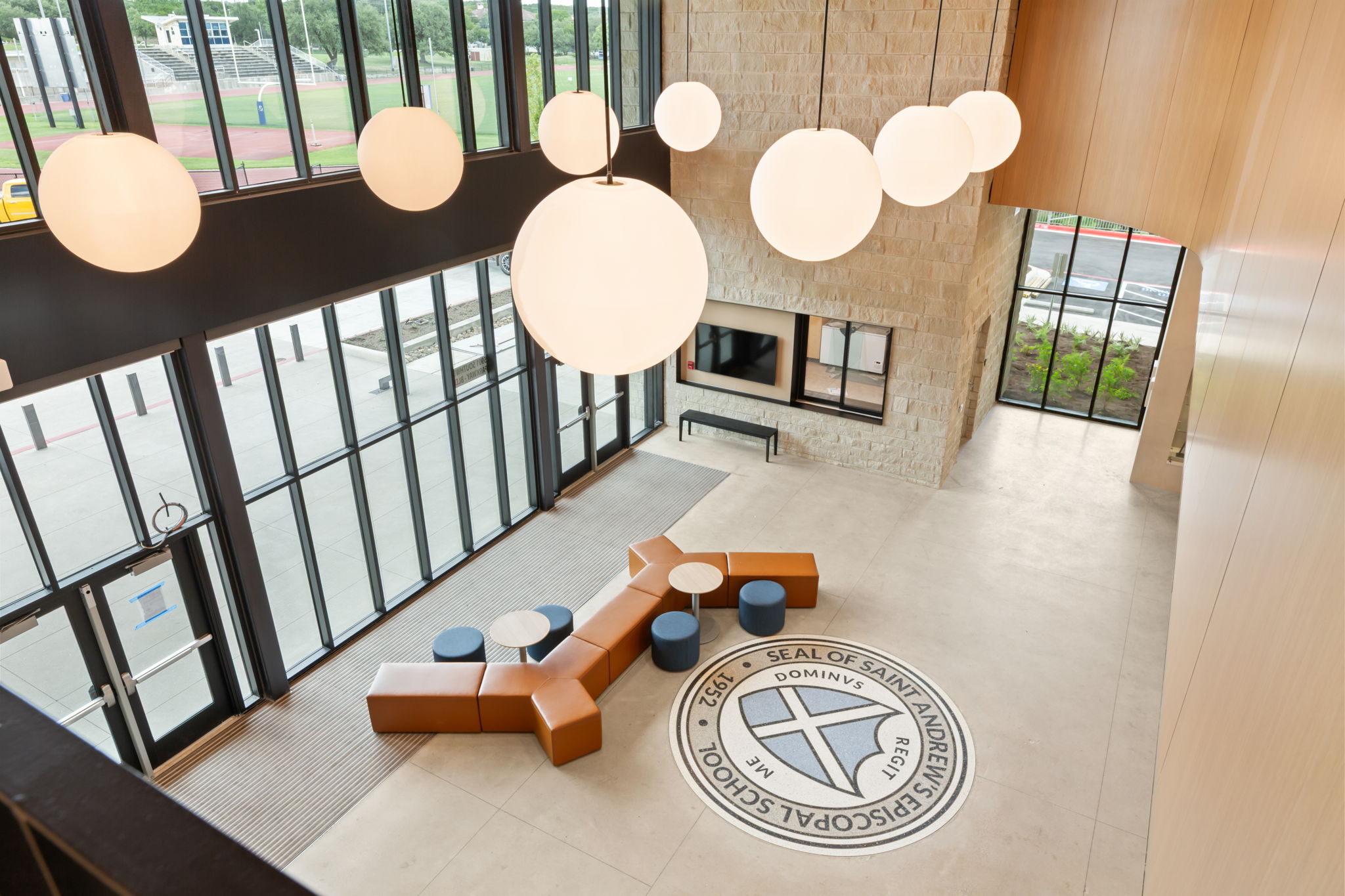 Overhead photo of student couches by SAS seal.