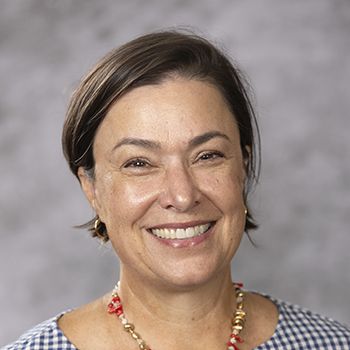 Headshot style photo of Alice Nezzer.